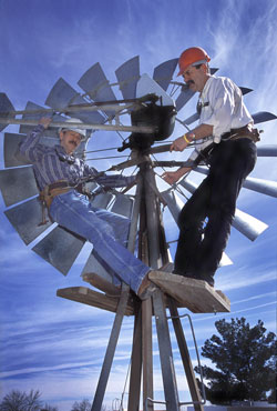 instructors atop a windmill