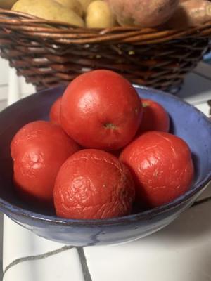 Image of red, wrinkly tomatoes